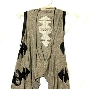 Sleeveless cardigan/vest, size small
